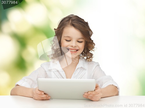 Image of happy smiling girl with tablet pc computer