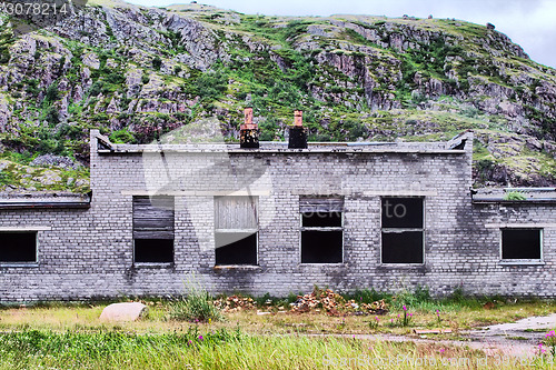 Image of ruins of destroyed an abandoned house