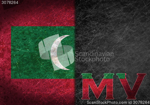 Image of Old rusty metal sign with a flag and country abbreviation