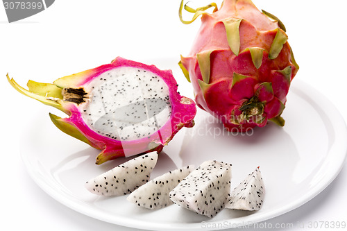 Image of Pitaya Fruit Wedges, A Halved And A Whole Fruit