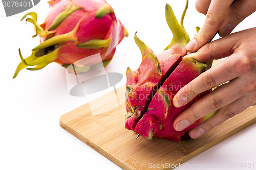 Image of Close-up Of A First Cut Through A Dragon Fruit