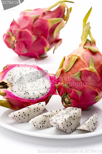 Image of Closeup Of Red-Skinned Pitaya And Its Creamy Pulp