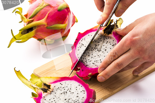 Image of First Cut Through One Half Of A Pitaya