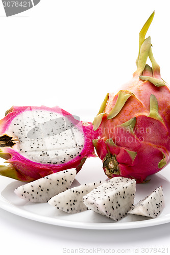 Image of Pitaya And Its Fruit Flesh On A White Plate