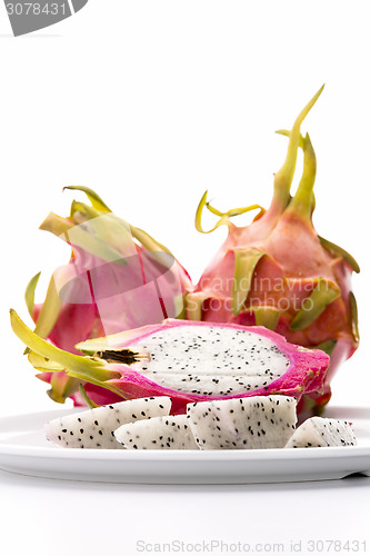 Image of Fruit Pulp Of The Strawberry Pear On A White Plate