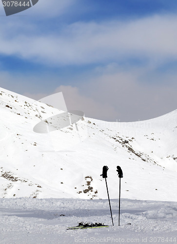 Image of Ski and skiing equipment on slope