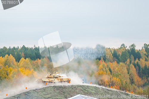 Image of Tank T-90S shoots on hill