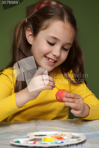 Image of Girl painted Easter eggs