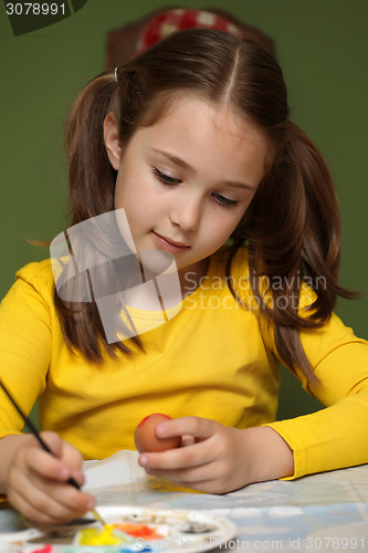 Image of Girl painted Easter eggs