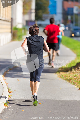 Image of Group of people running.