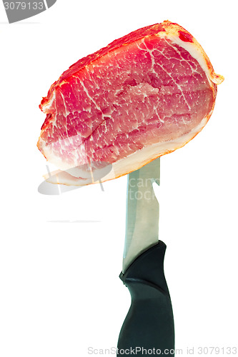 Image of Ham on the edge of a knife on a white background.