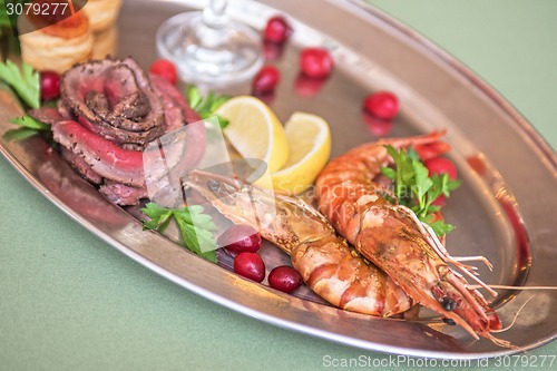 Image of Grilled shrimps and beef meat 