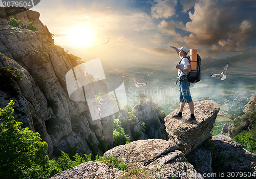 Image of Tourist on rocks