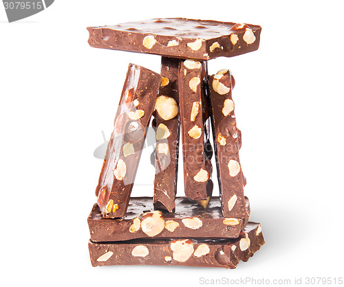 Image of Pyramid of tiles of dark chocolate with hazelnuts