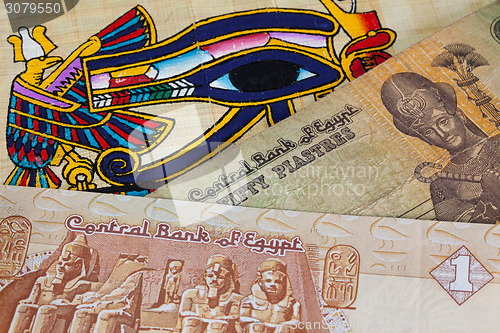 Image of Typical Egyptian papyrus and different banknotes