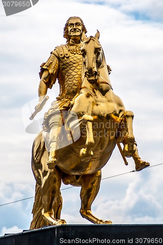 Image of Golden equestrian