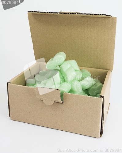 Image of packaging box with green foam