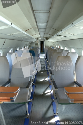 Image of Interior of an airplane with many seats