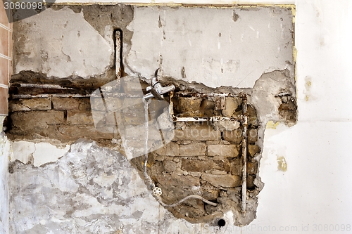 Image of Damaged wall plumbing