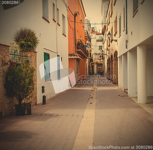 Image of Tossa de Mar, Spain, ancient street at summer day