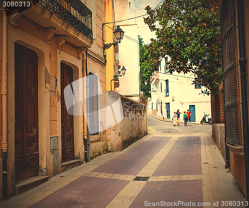 Image of Tossa de Mar, Spain, Carrer la Guardia street at summer day