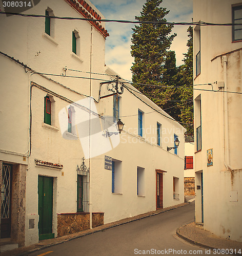 Image of Tossa de Mar, Spain, Carrer la Guardia street at summer day