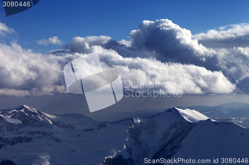 Image of Winter mountains in nice evening and sunlight clouds