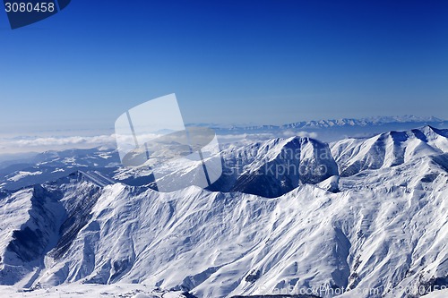 Image of Winter snowy mountains in sun morning