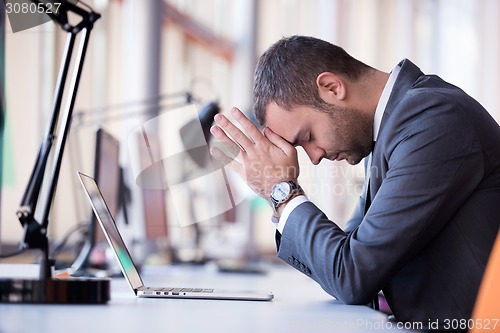 Image of frustrated young business man