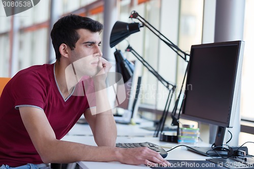 Image of frustrated young business man