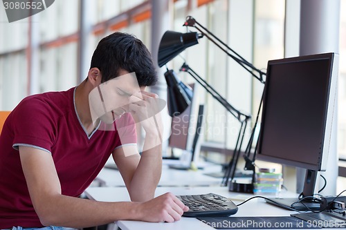 Image of frustrated young business man