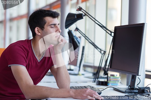 Image of business man at the office