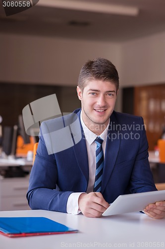 Image of business man at the office