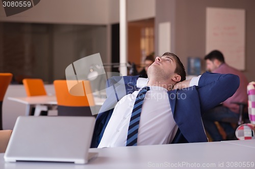 Image of business man at the office