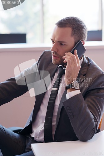 Image of business man at the office