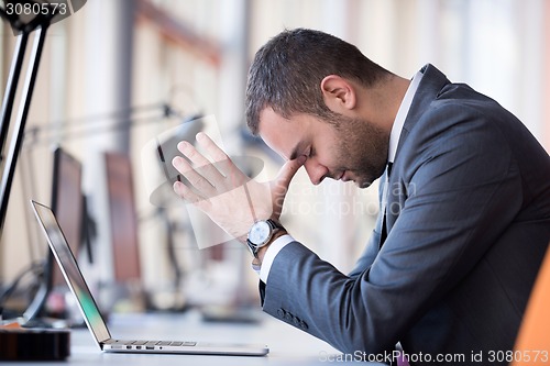 Image of frustrated young business man