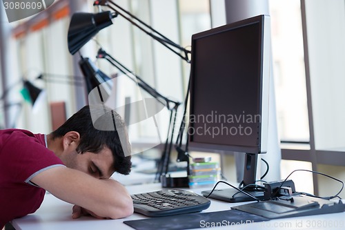 Image of business man at the office