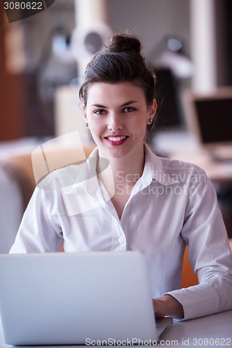 Image of business woman at office