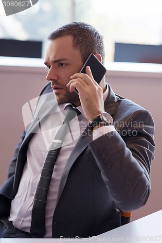 Image of business man at the office