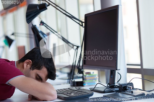 Image of business man at the office