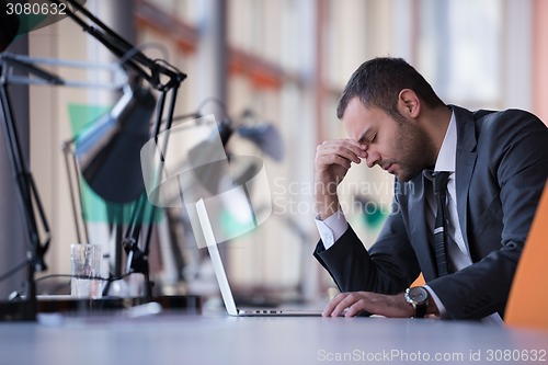 Image of business man at the office