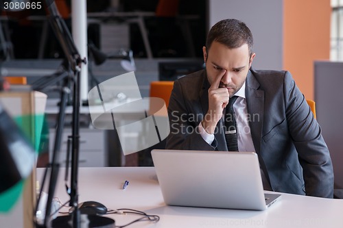Image of business man at the office