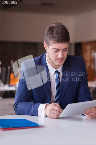 Image of business man at the office