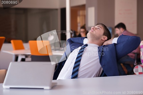 Image of business man at the office