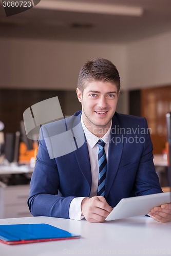 Image of business man at the office