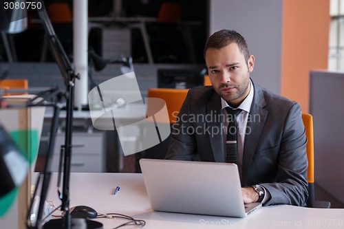 Image of business man at the office