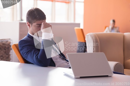 Image of frustrated young business man