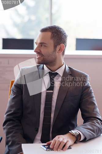 Image of business man at the office