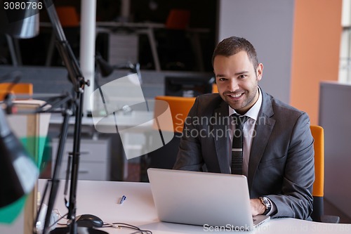 Image of business man at the office