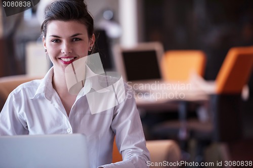 Image of business woman at office